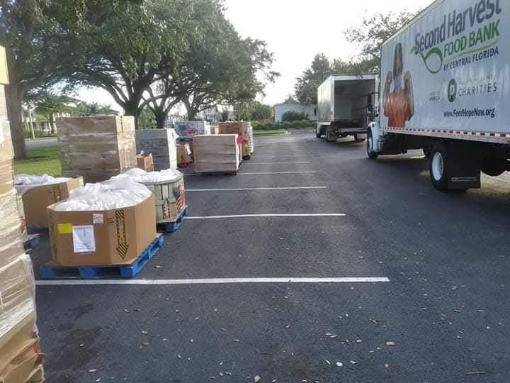 Second Harvest Food Bank truck delivering pallets to Good Samaritan Outreach